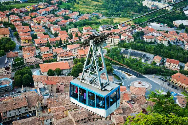 Taking the cable car up to San Marino’s historic center