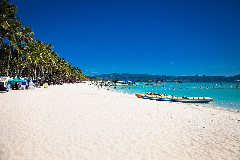 Banana boat on white beach boracay